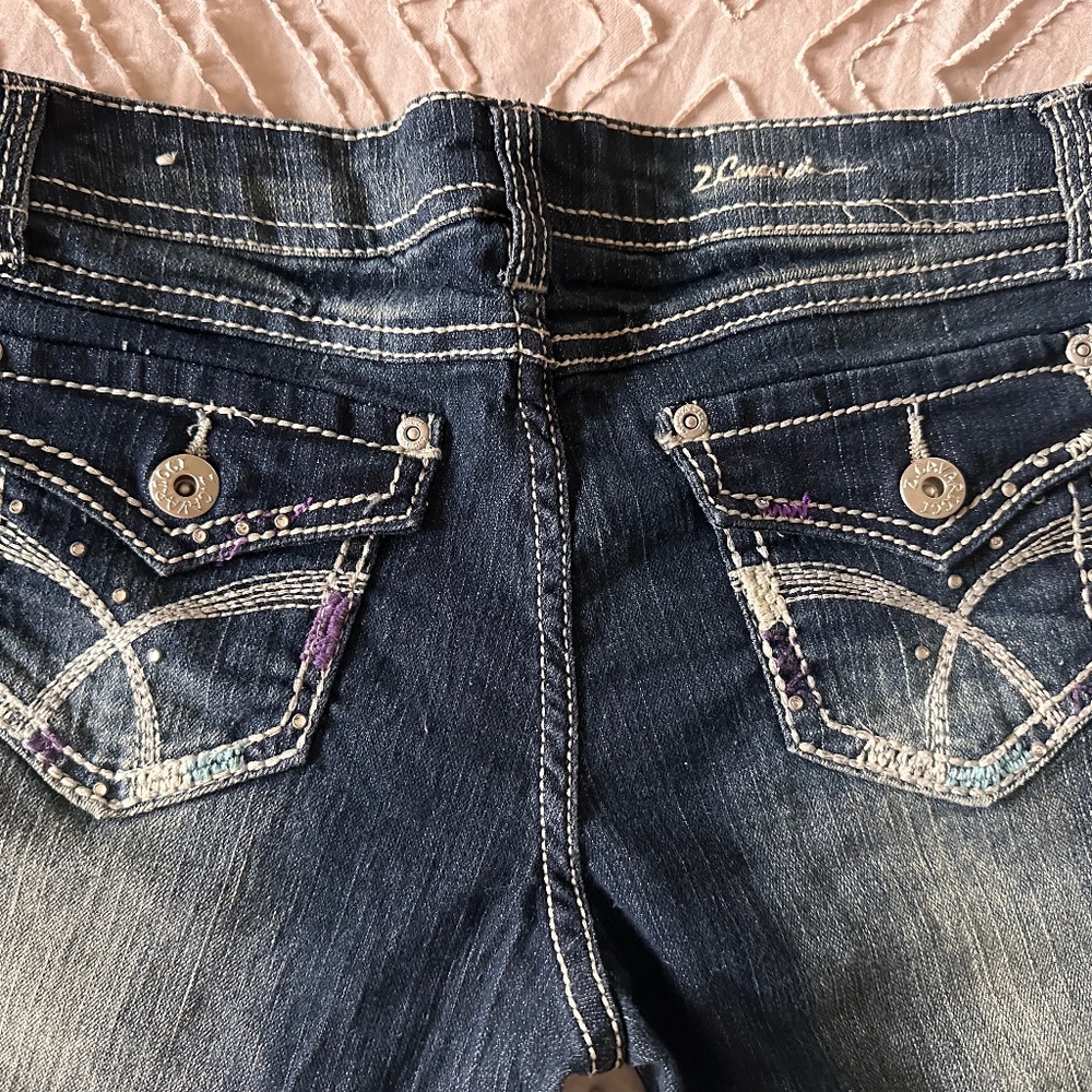 Z Cavaricci Boot CutJeans in a Size Small